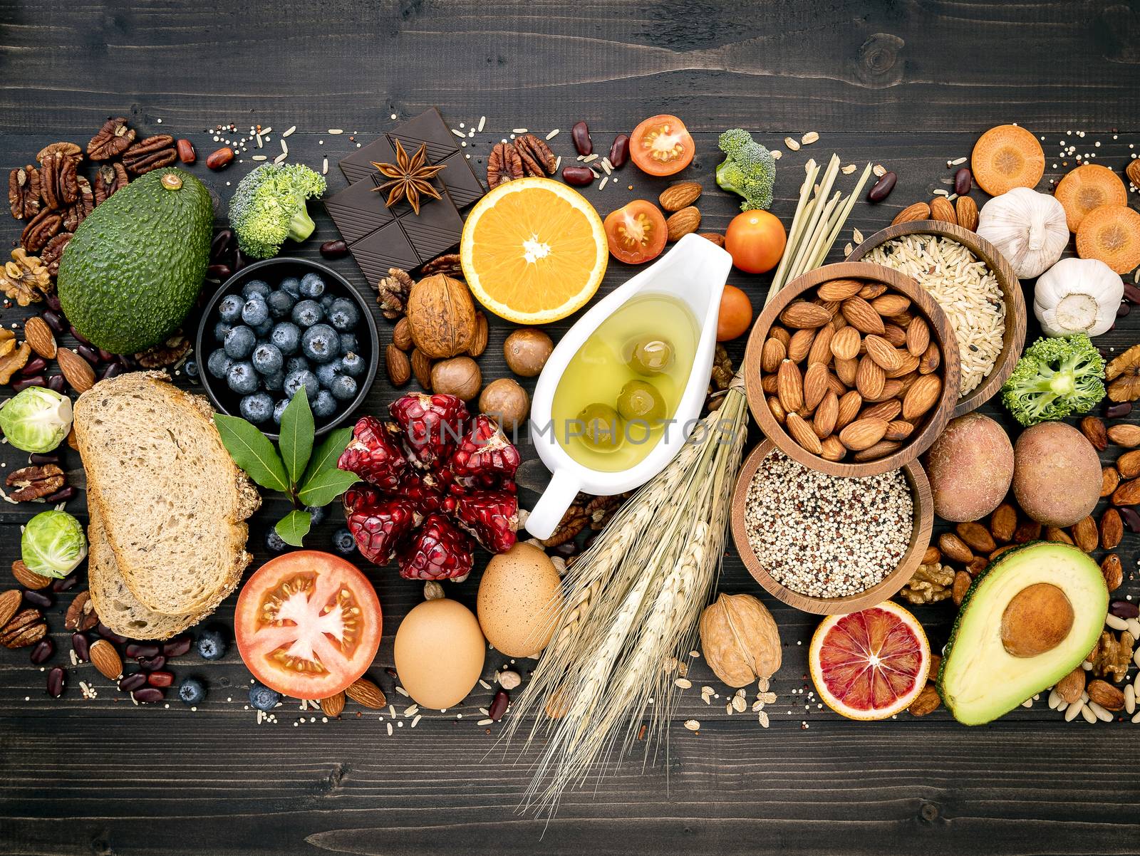 Ingredients for the healthy foods selection. The concept of healthy food set up on wooden background.