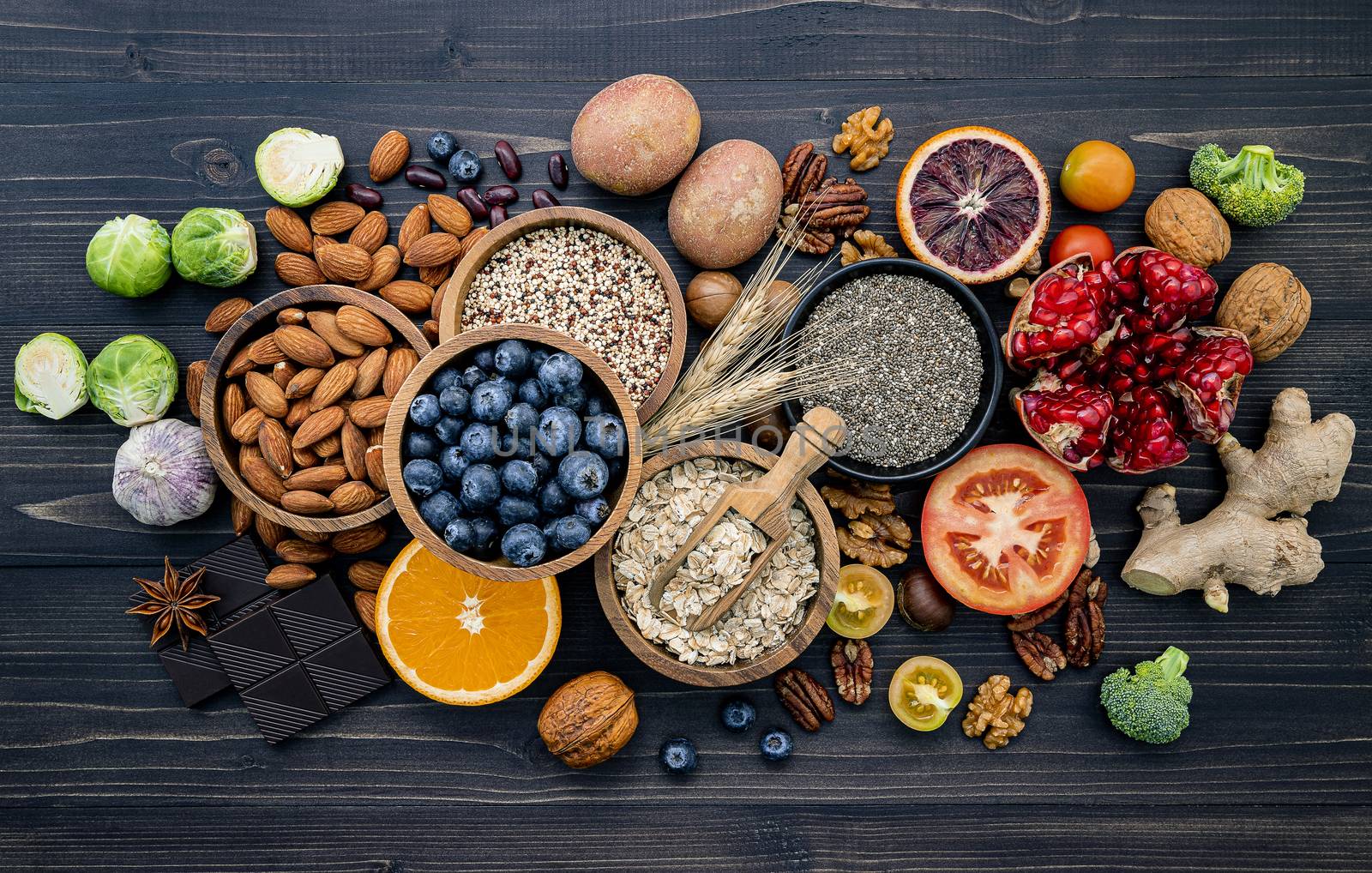 Ingredients for the healthy foods selection. The concept of healthy food set up on wooden background.