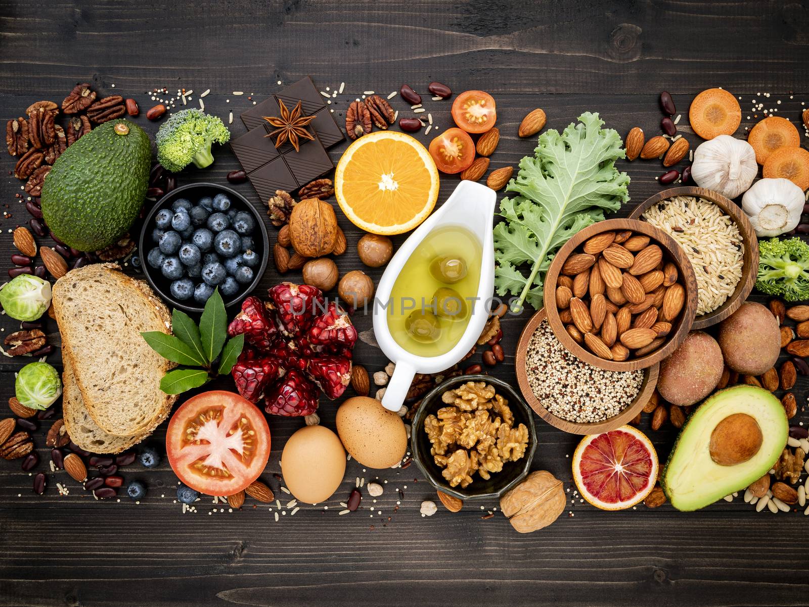 Ingredients for the healthy foods selection. The concept of healthy food set up on wooden background.