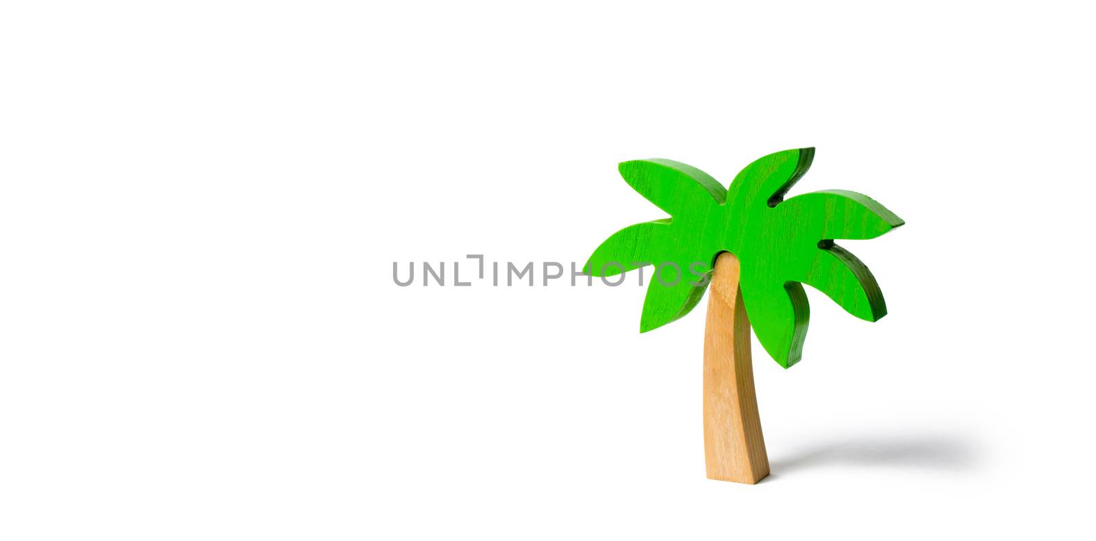 Wooden palm tree on an isolated background. Conceptual leisure and vacation, entertainment and relaxation. Tours and cruises to warm countries. The development of tourism. Tropical island. by iLixe48