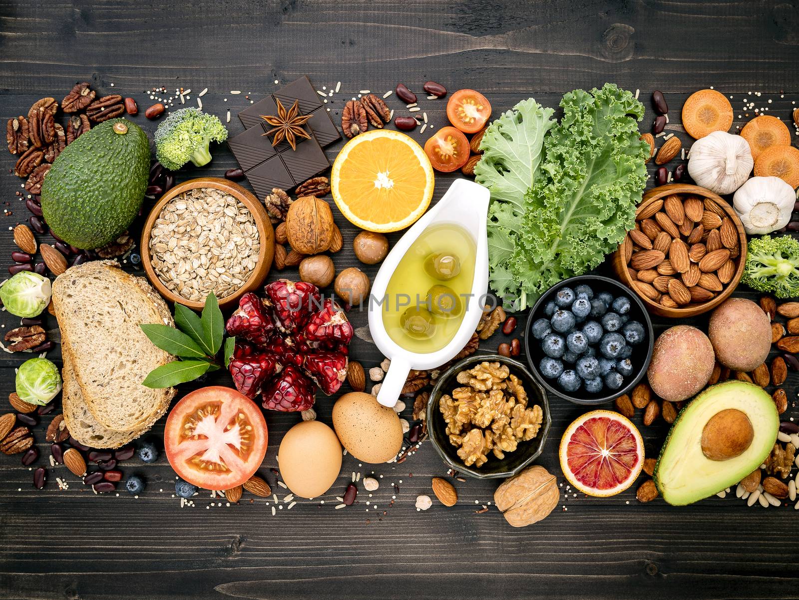 Ingredients for the healthy foods selection. The concept of healthy food set up on wooden background.