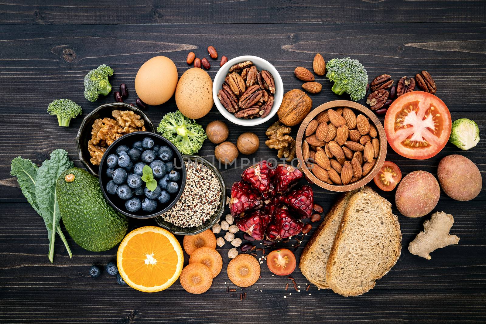 Ingredients for the healthy foods selection. The concept of healthy food set up on wooden background.