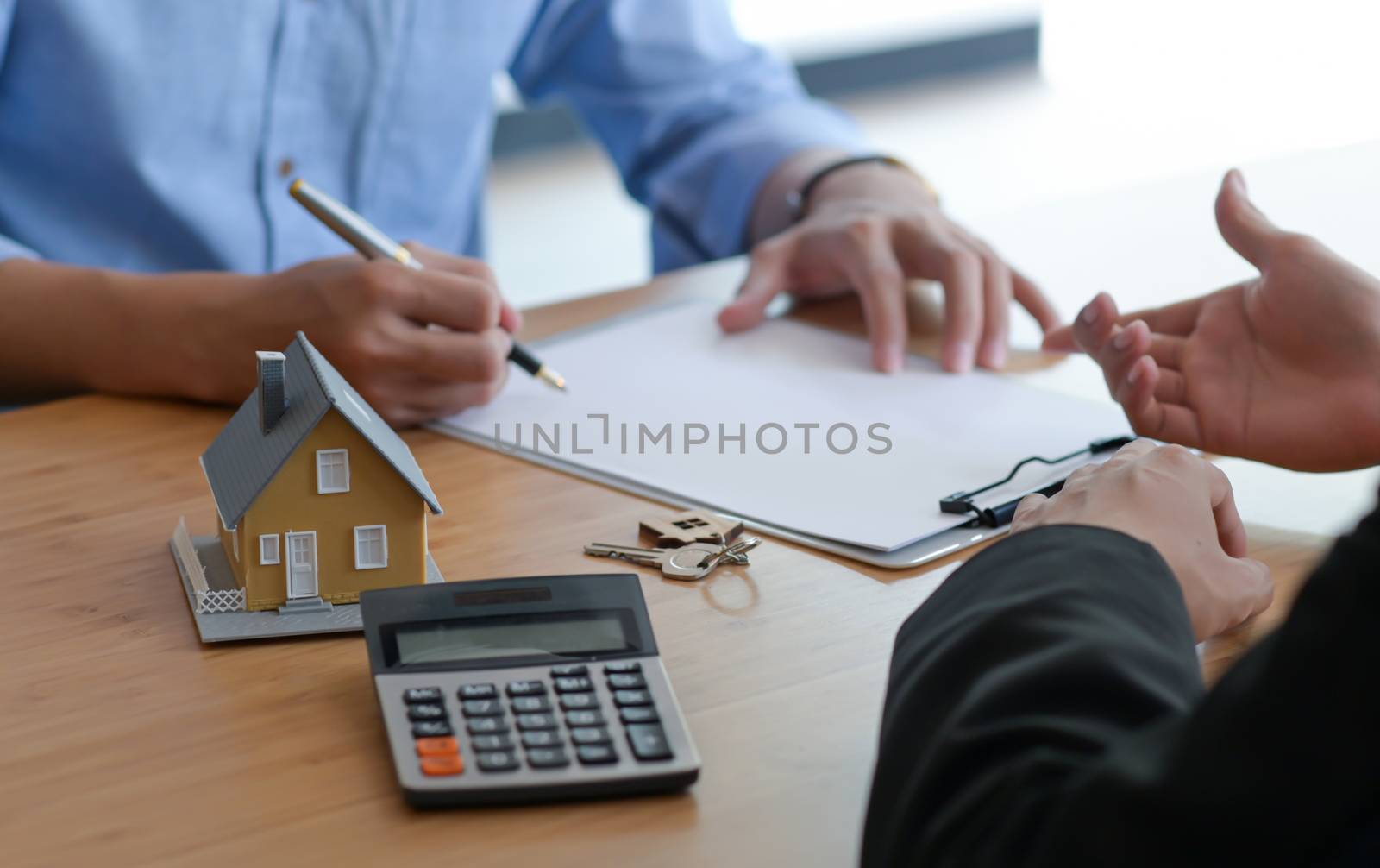 Signing of a contract of sale between the buyer and seller. by poungsaed