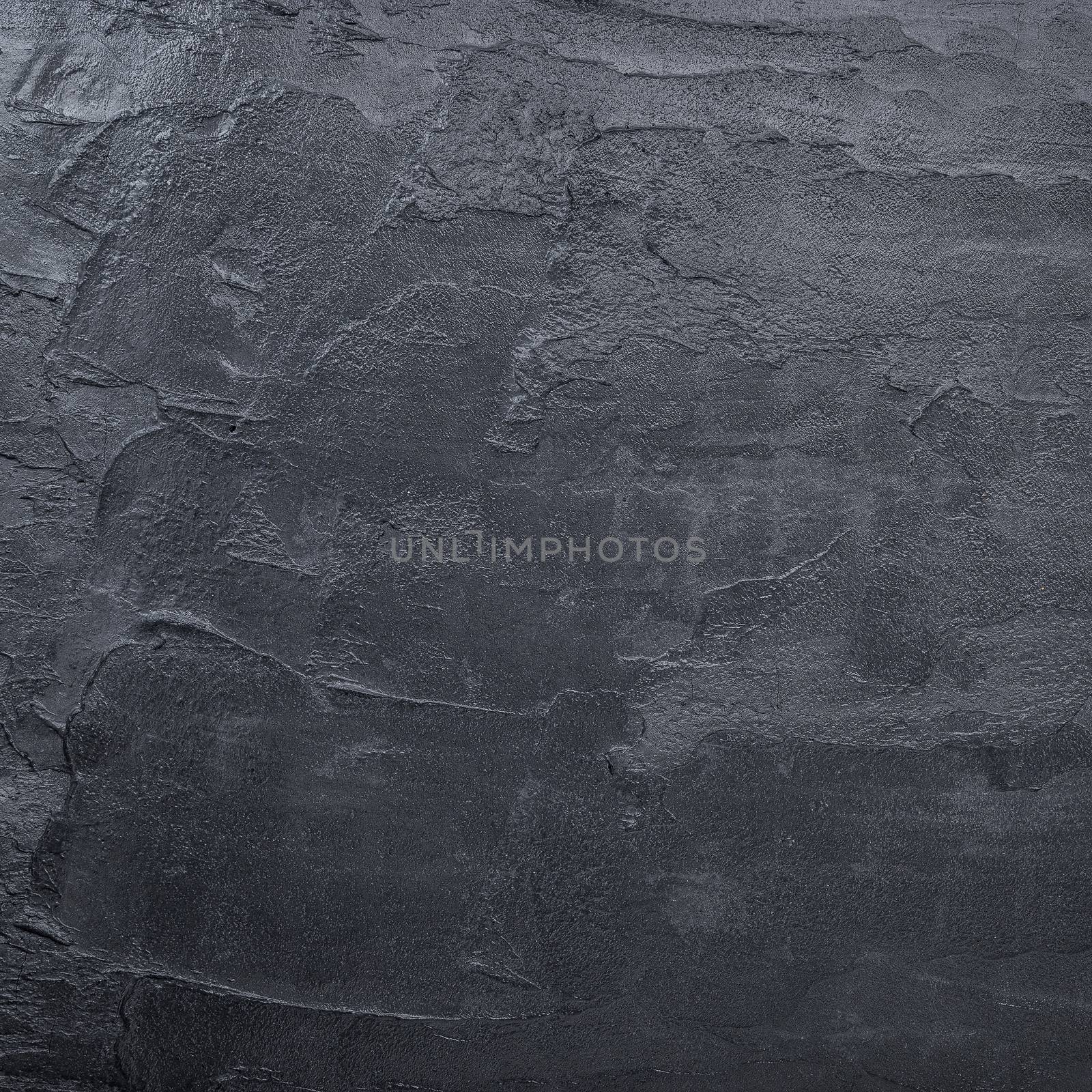 Dark black concrete wall texture background. Natural black slate by kerdkanno