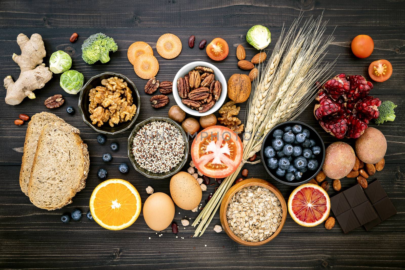 Ingredients for the healthy foods selection. The concept of healthy food set up on wooden background.