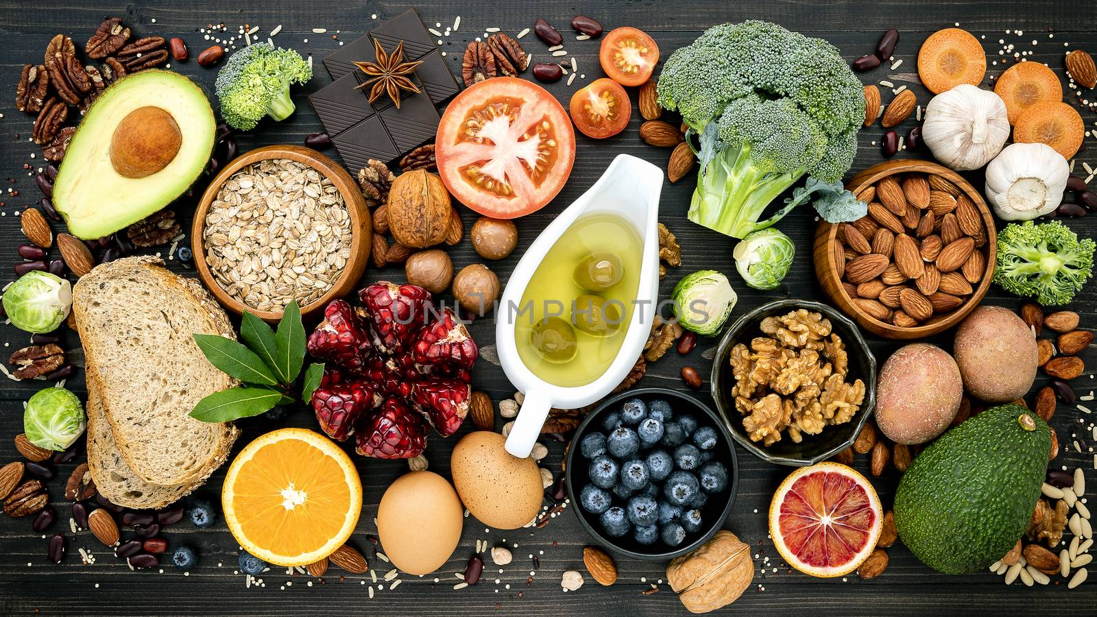 Ingredients for the healthy foods selection. The concept of healthy food set up on wooden background.