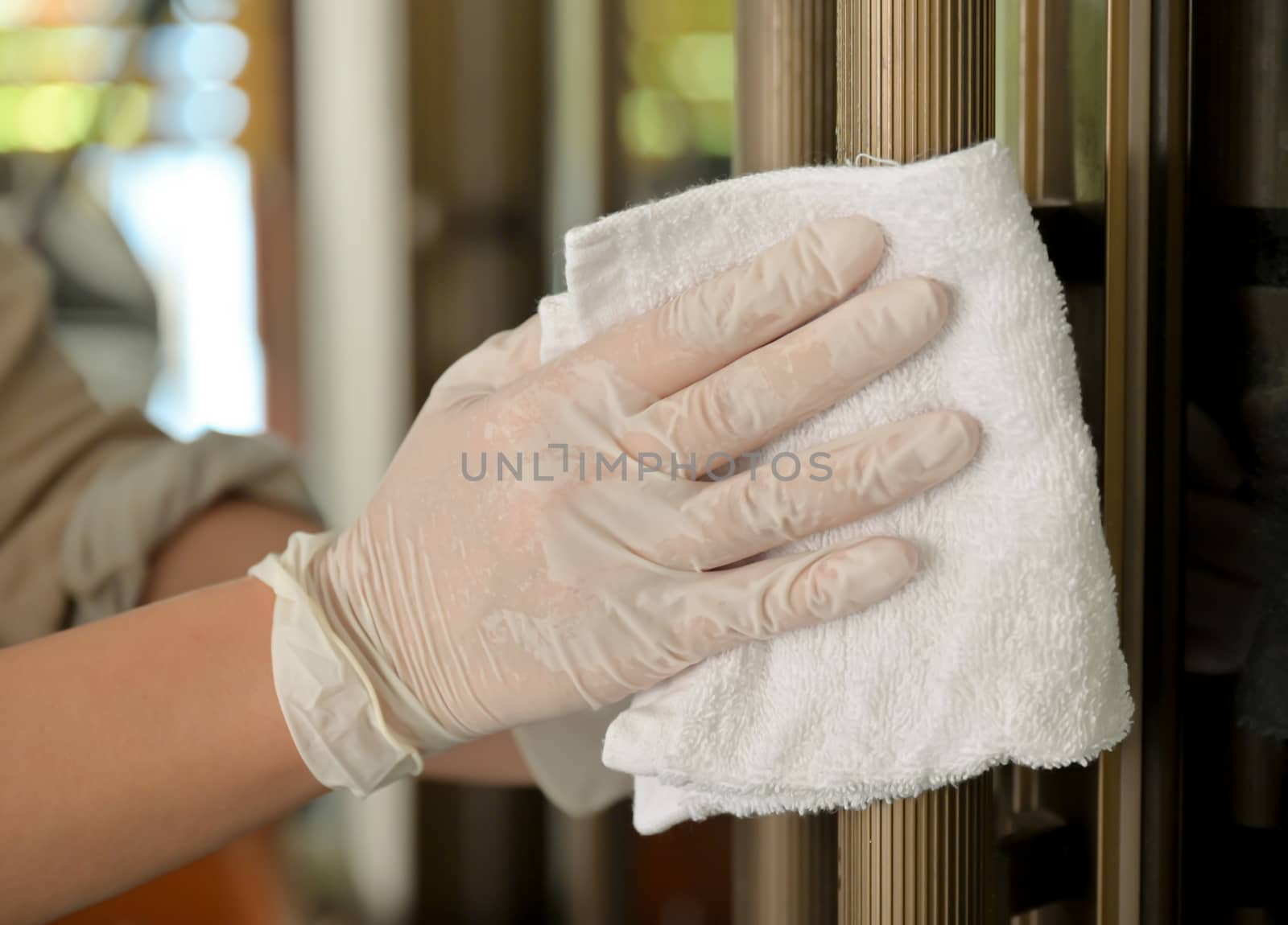 Close-up shot of Cleaning wipes at the door handles to prevent d by poungsaed