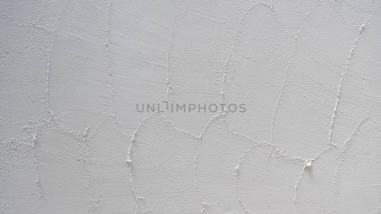 White concrete wall texture background. by poungsaed