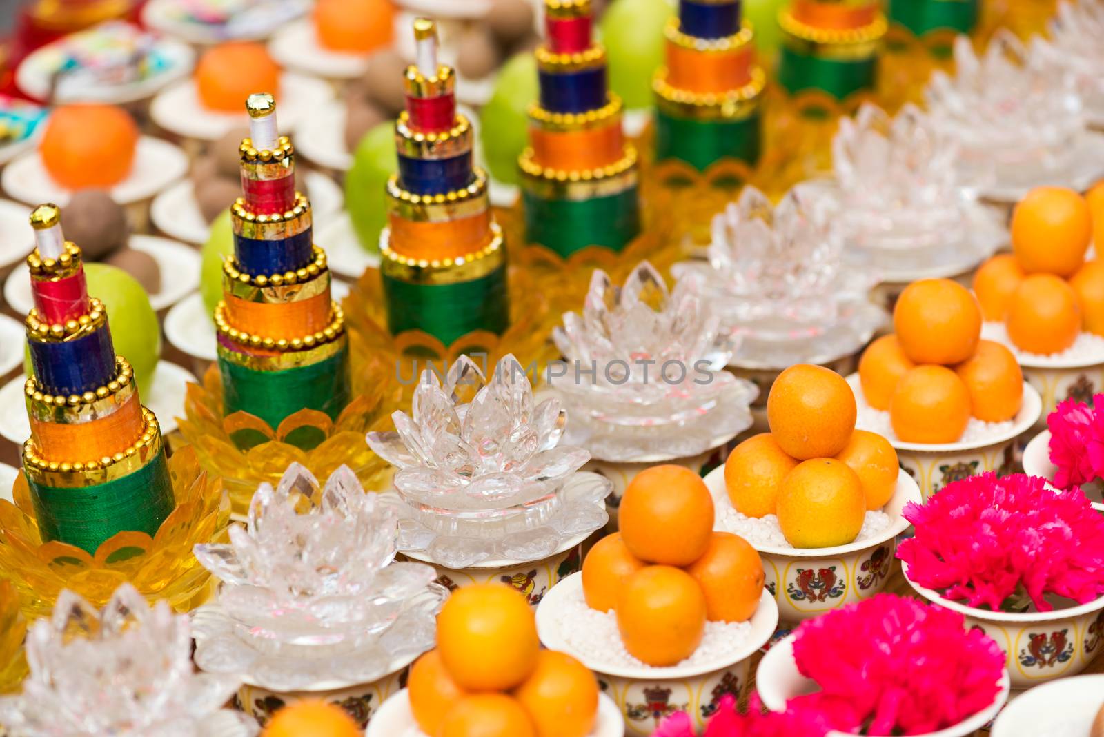 Multicolor presents for Buddha in a chinese buddhist temple, Wenshu Monastery, Chengdu, China