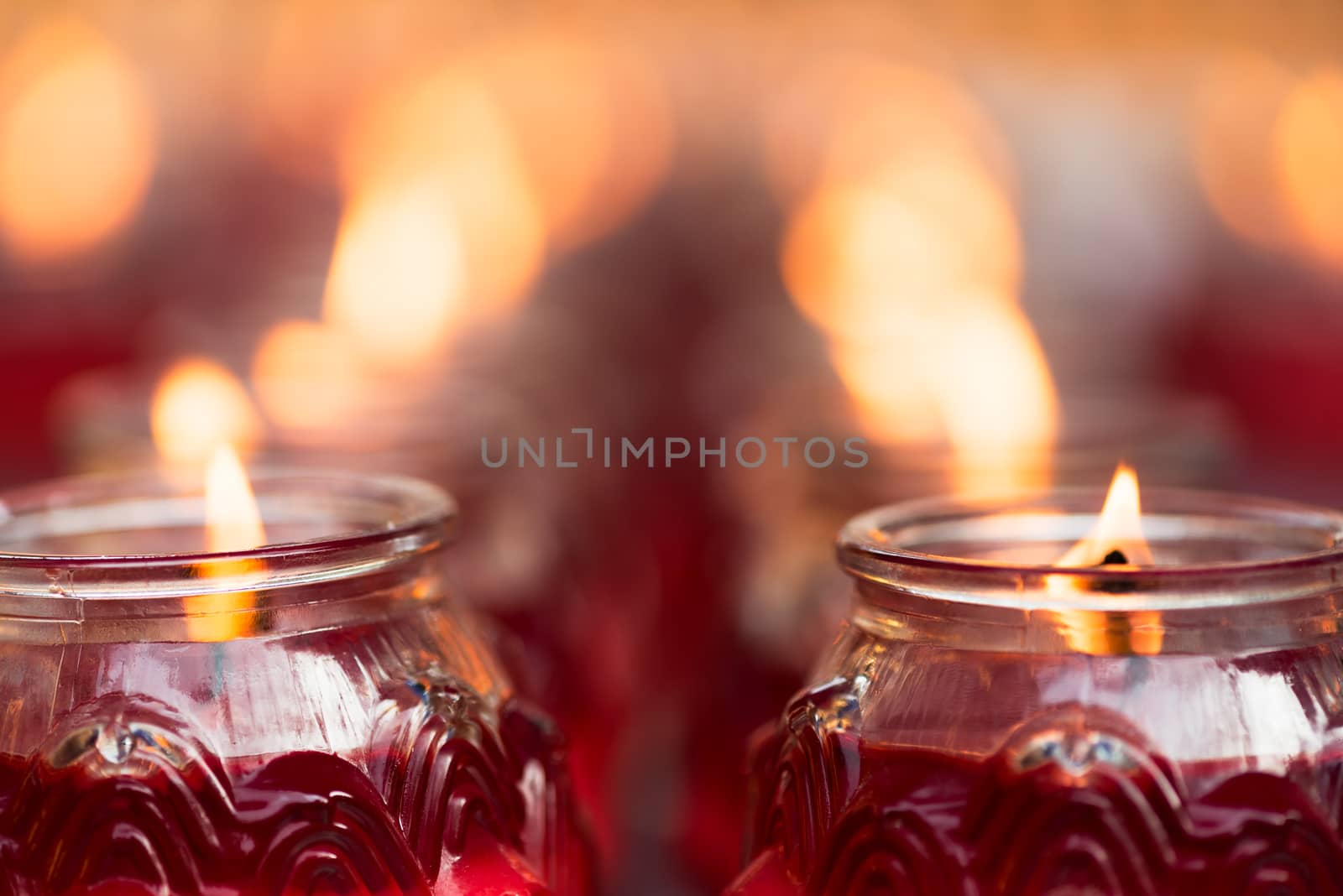 Red candles burning in a chinese buddhist temple, Wenshu Monastery, Chengdu, China