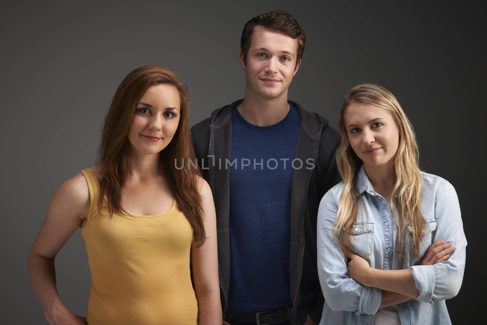 Studio Portrait Of Young Friends Together by HWS