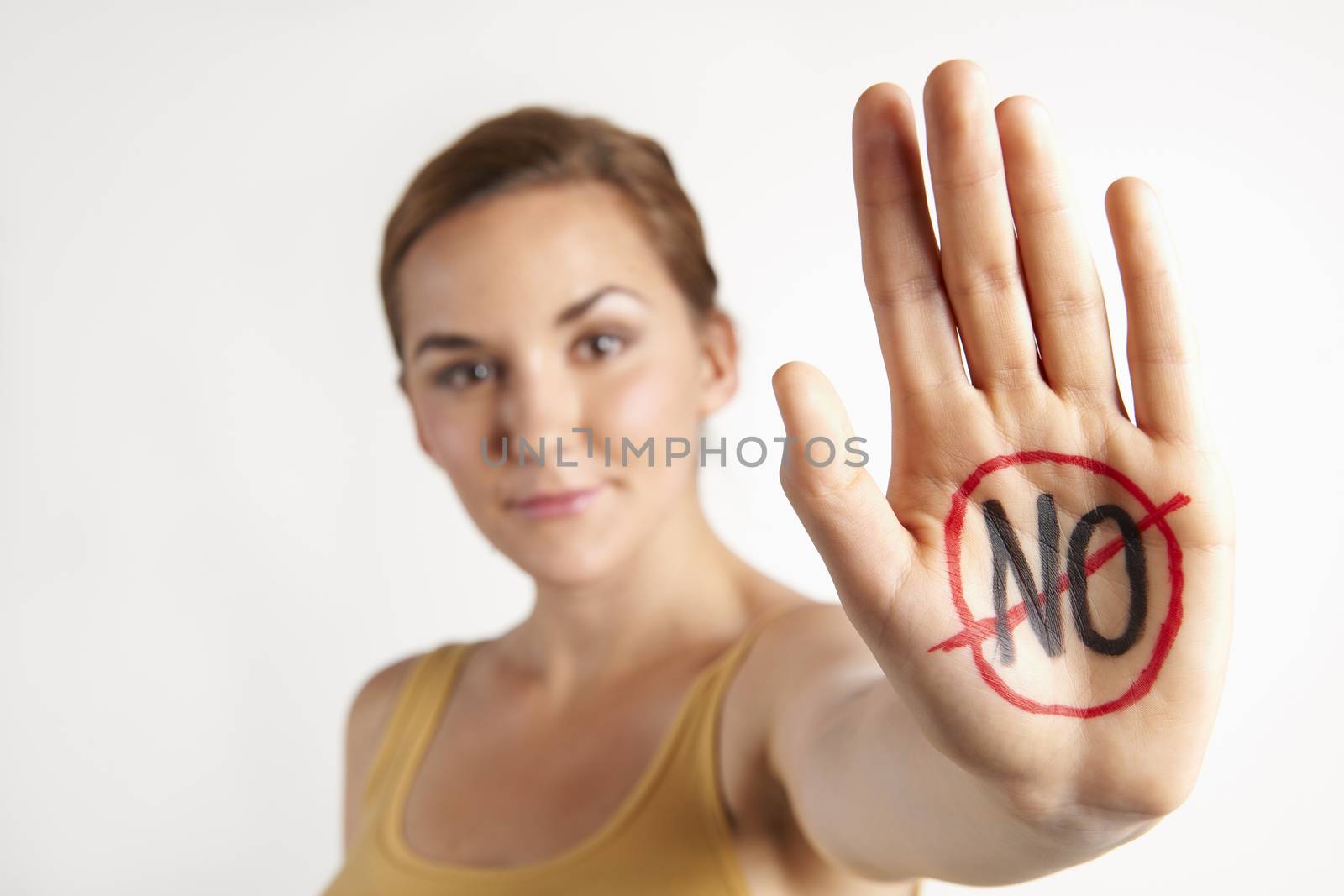 Female Protestor With "No" Written On Palm