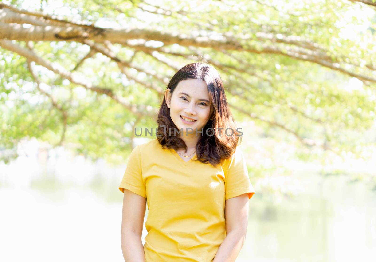 Woman happy feeling with green nature background