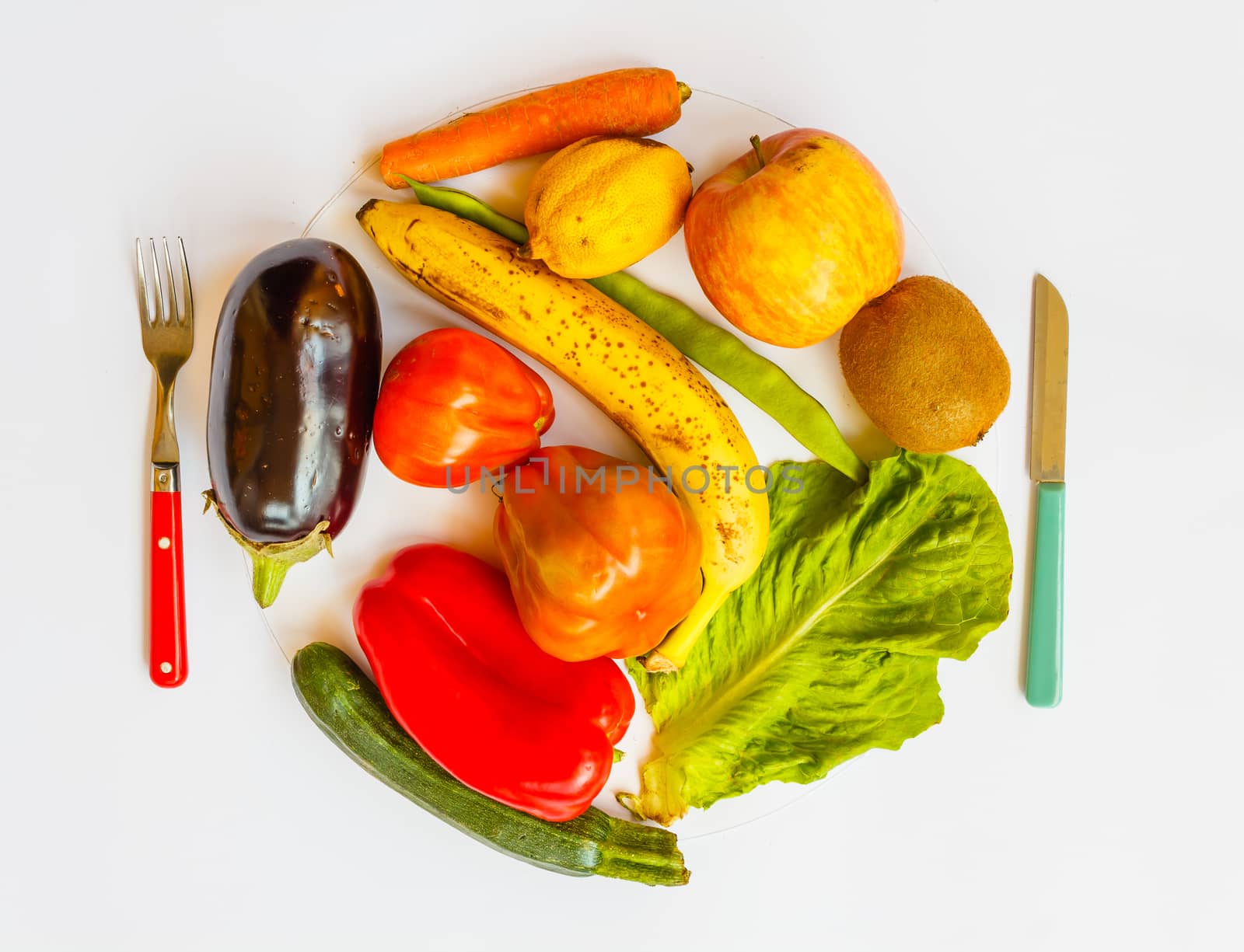 a plate of  coloured vegetables and fruits by moorea