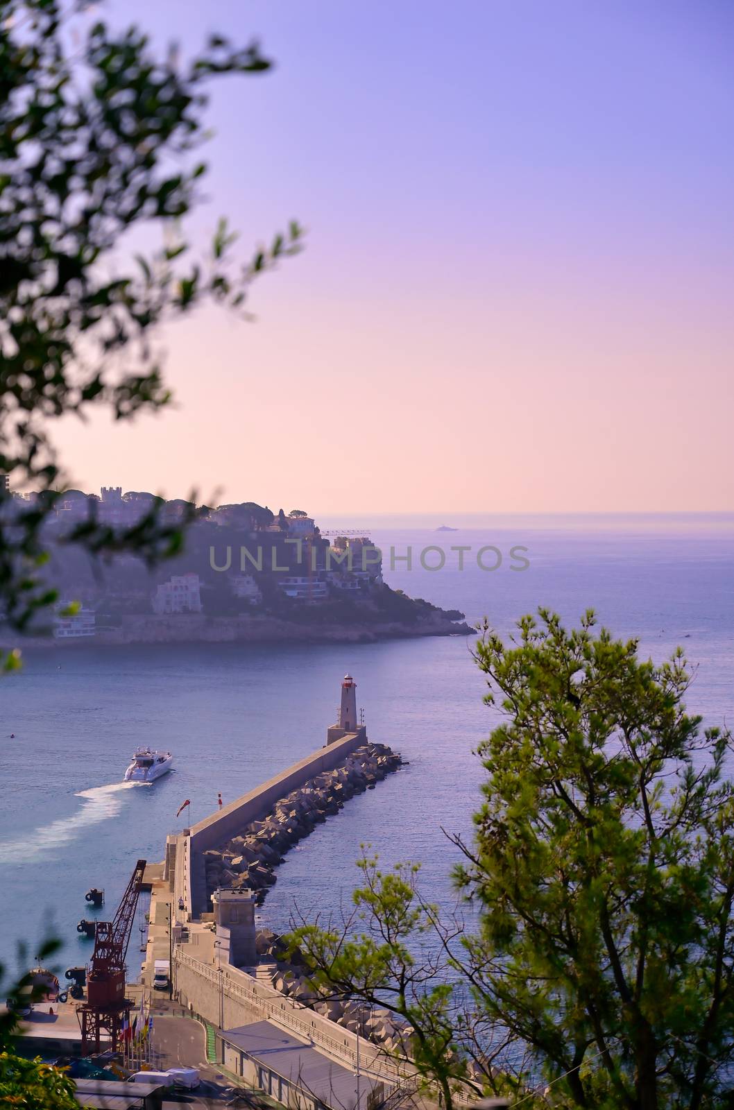 The lighthouse at the Port of Nice on the Mediterranean Sea at Nice, France along the French Riviera.