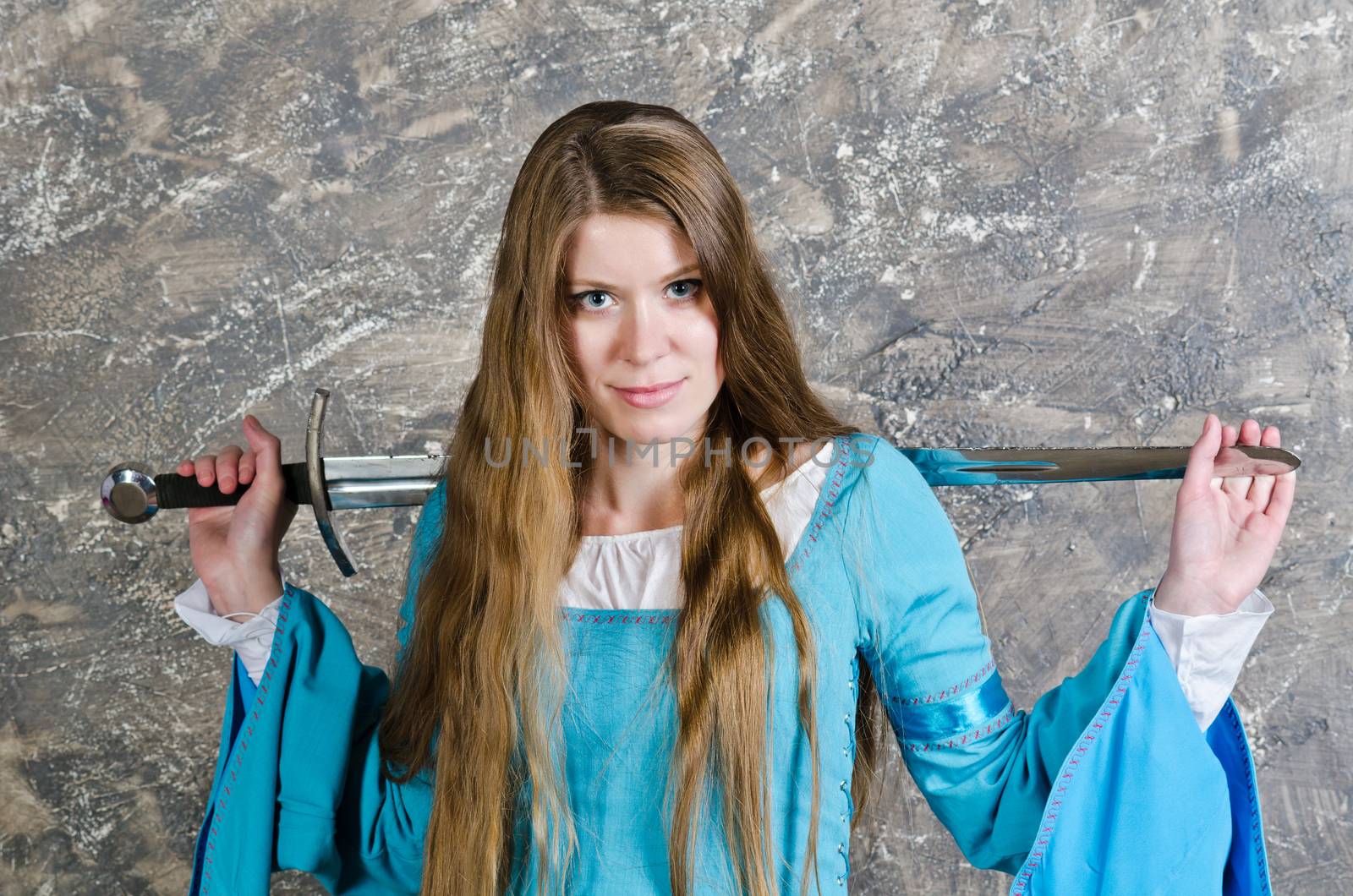 Young woman with long hair poses with sword by nemo269