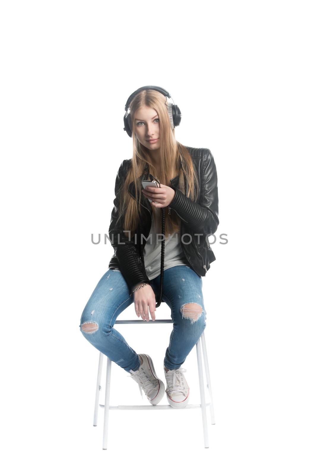 Isolated on white cute teenager girl portrait in wired headphones by nemo269