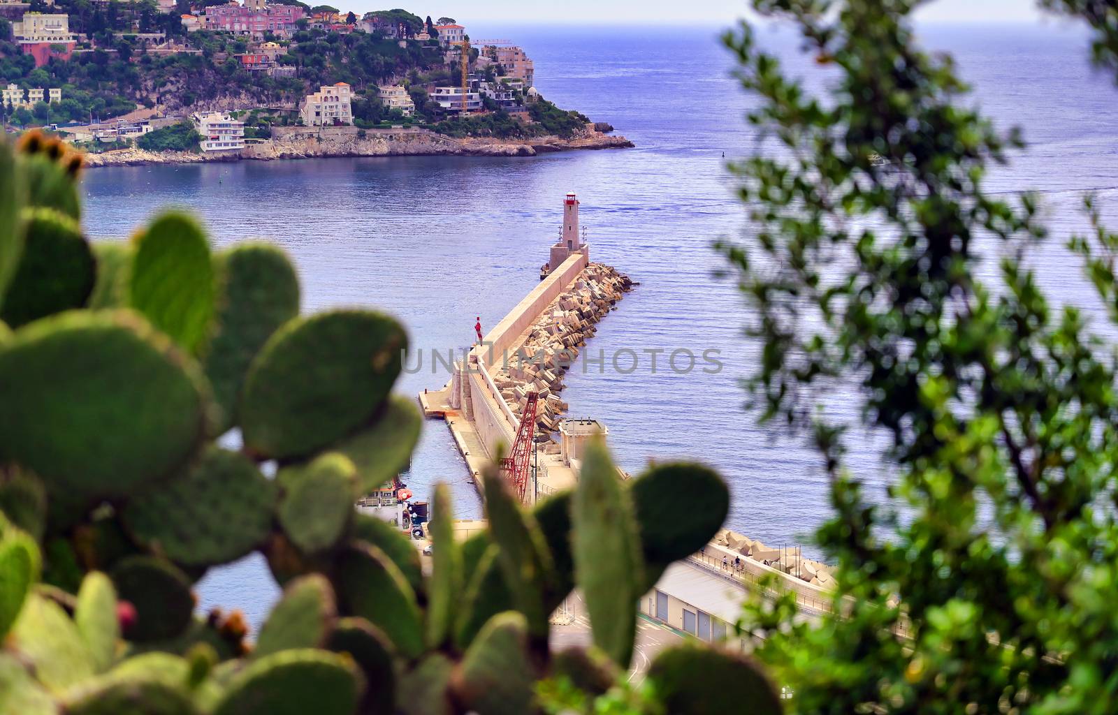 The lighthouse at the Port of Nice on the Mediterranean Sea at Nice, France along the French Riviera.