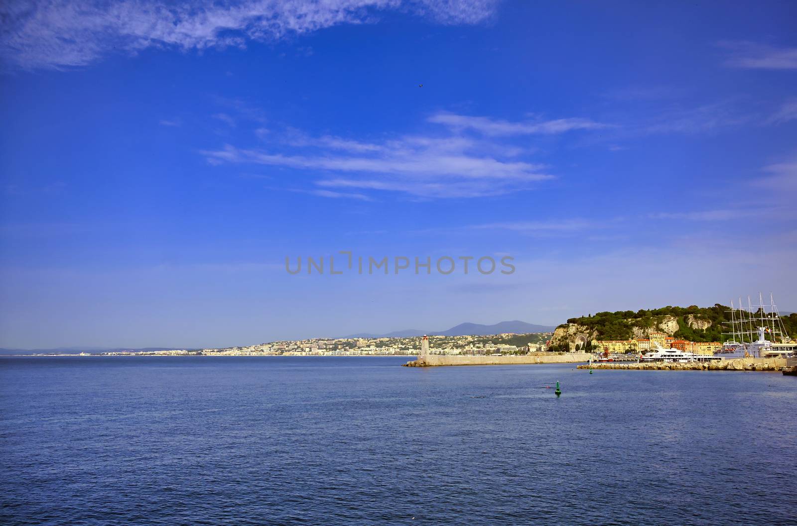 The lighthouse at the Port of Nice on the Mediterranean Sea at Nice, France along the French Riviera.