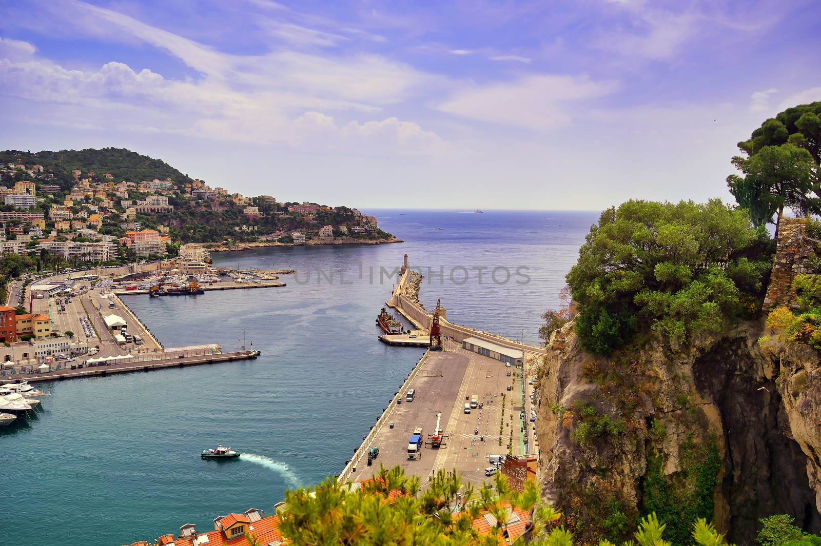 The lighthouse at the Port of Nice on the Mediterranean Sea at Nice, France along the French Riviera.