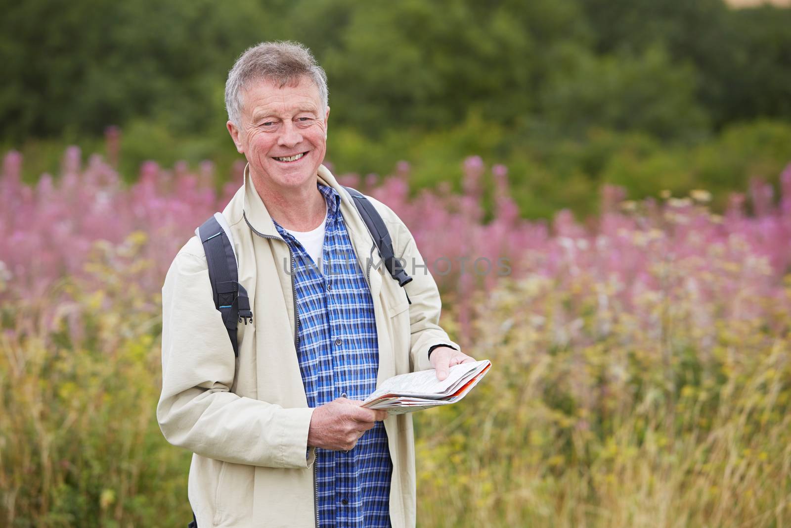 Senior Man Enjoying Hike In The Countryside by HWS