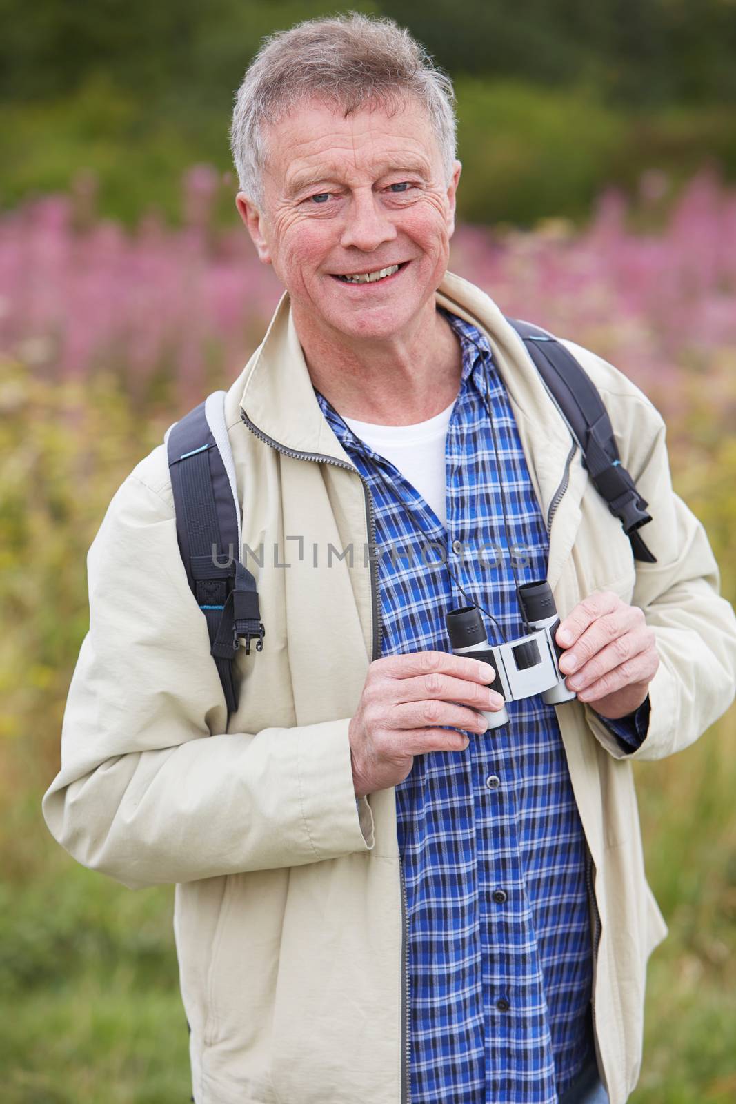 Senior Man On Walk With Binoculars by HWS