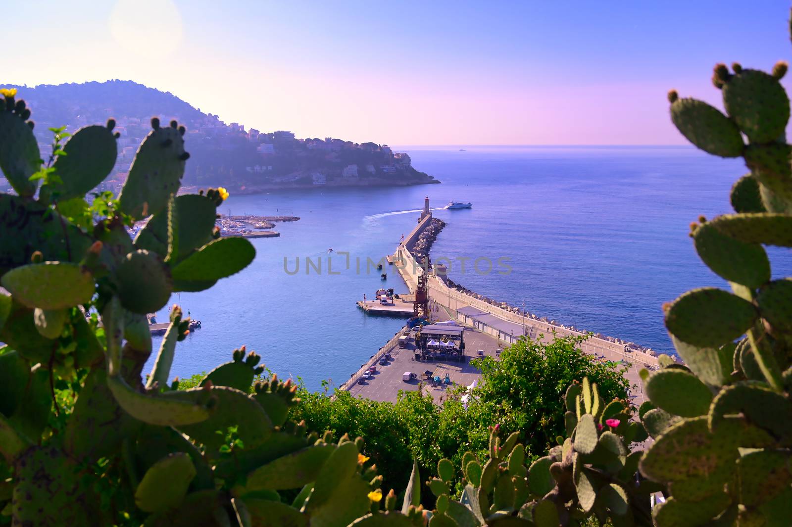 The lighthouse at the Port of Nice on the Mediterranean Sea at Nice, France along the French Riviera.