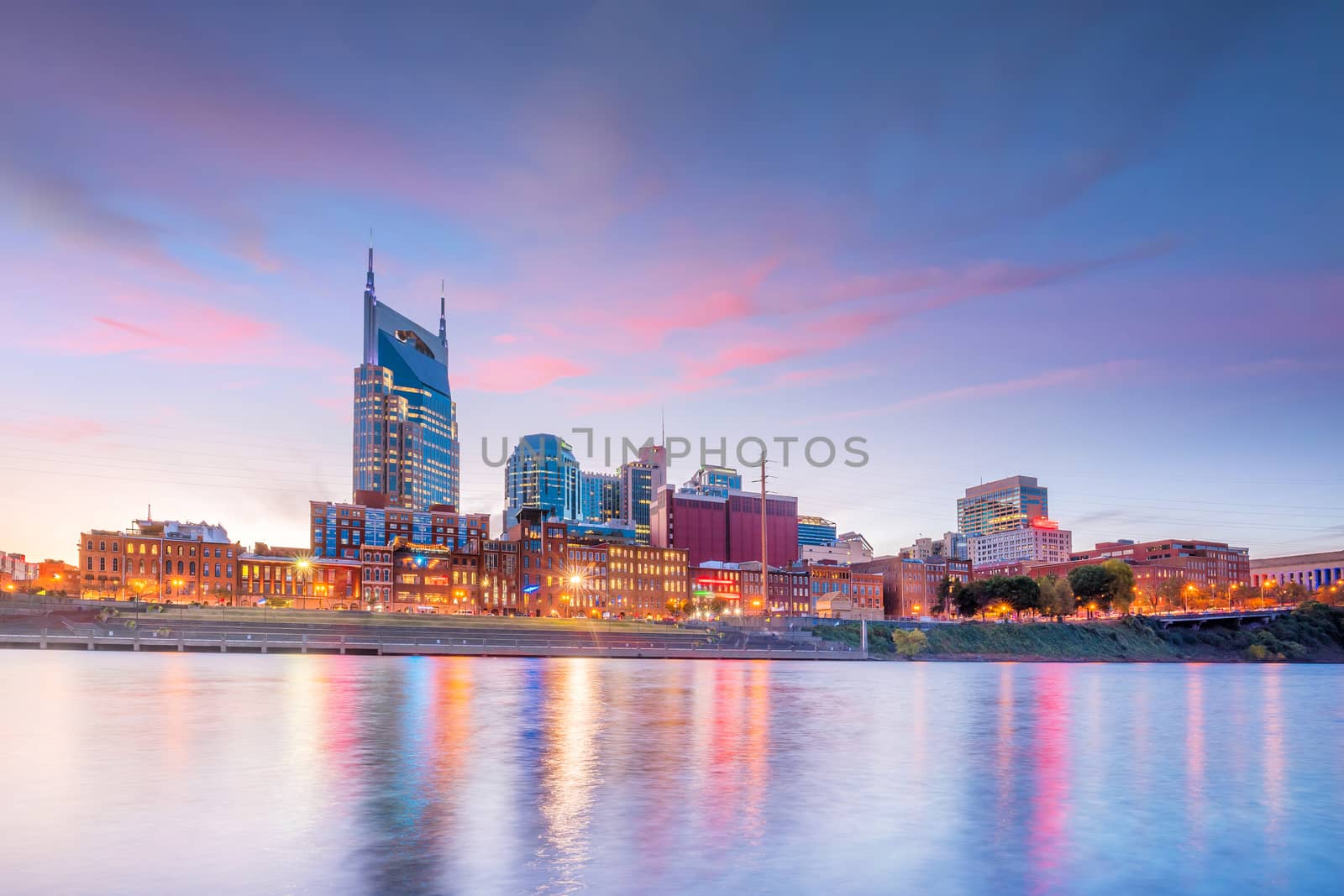 Nashville, Tennessee downtown skyline with Cumberland River in U by f11photo