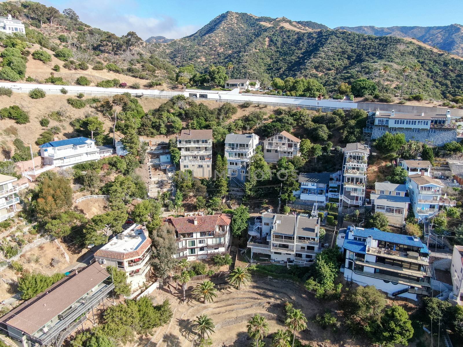 Aerial view of Avalon downtown with their houses on the cliff in Santa Catalina Island, USA by Bonandbon