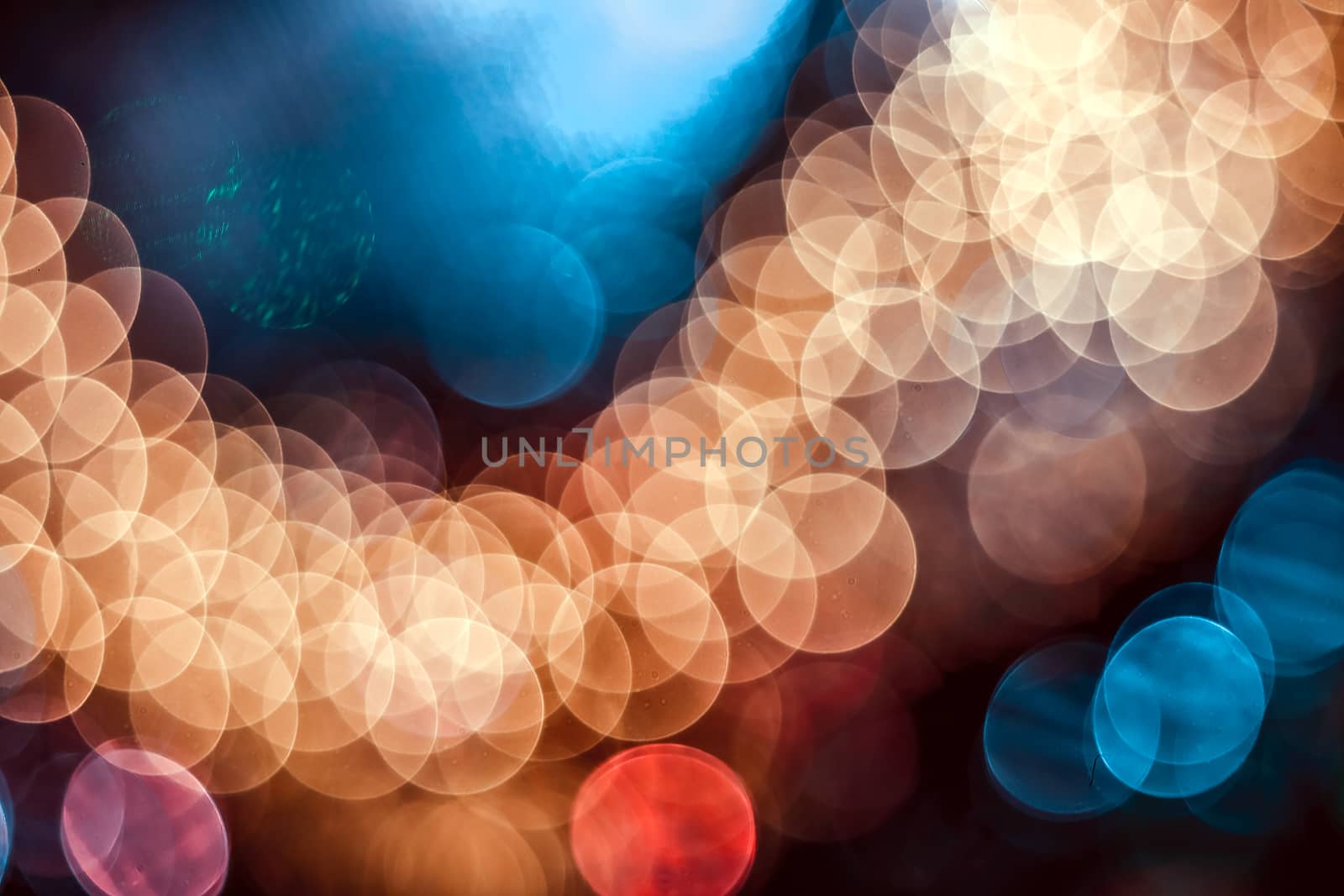 Festive Christmas elegant abstract background with bokeh lights. Background with defocused lights. Garland. Copy space.