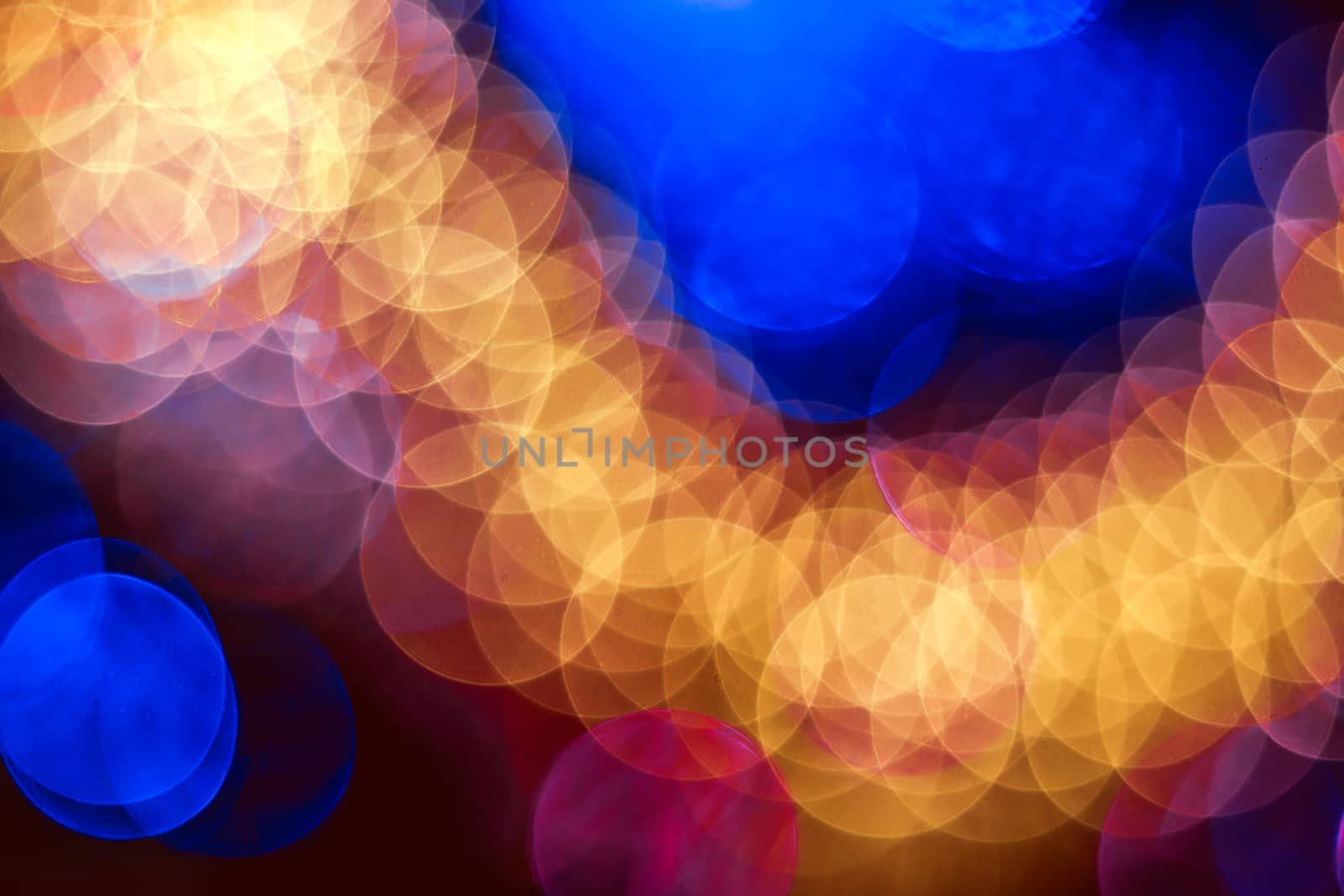 Christmas background. Festive abstract background with bokeh defocused lights. Beautiful shiny photo with bokeh. Garland. Copy space.