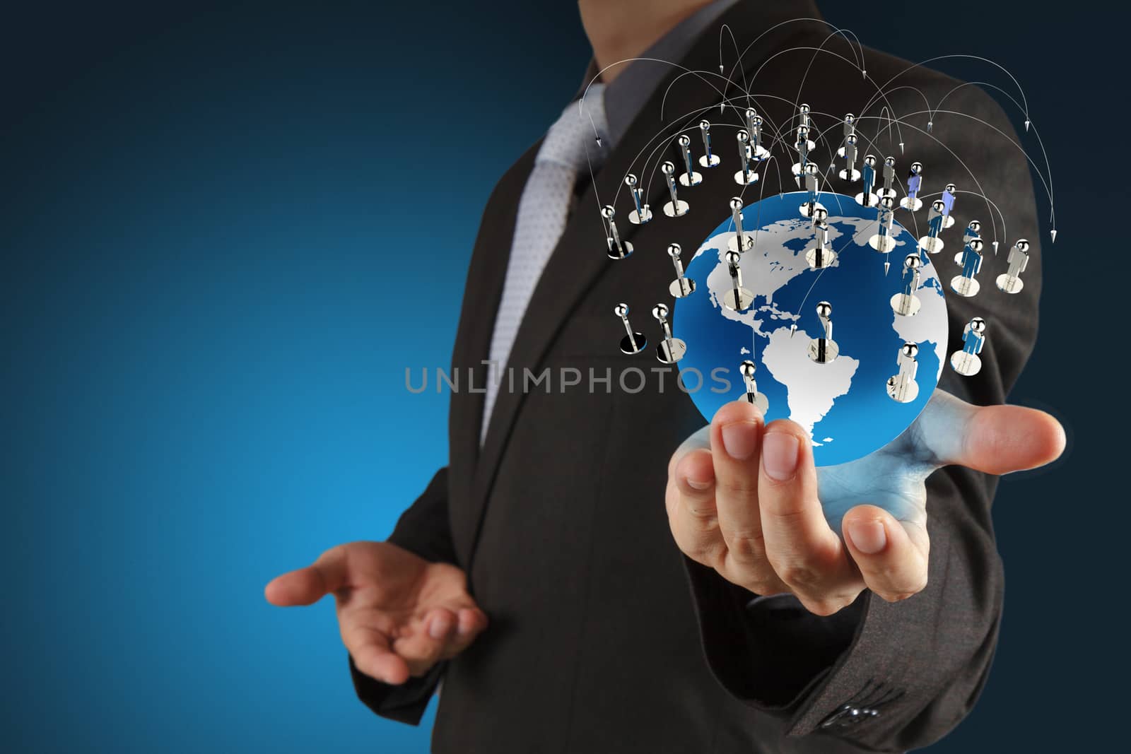 businessman hand holds social network  by everythingpossible