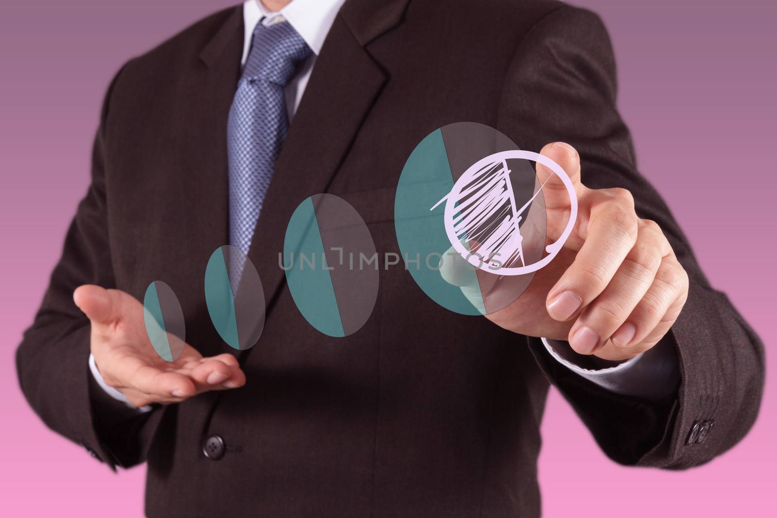 businessman hand drawing a pie chart  by everythingpossible