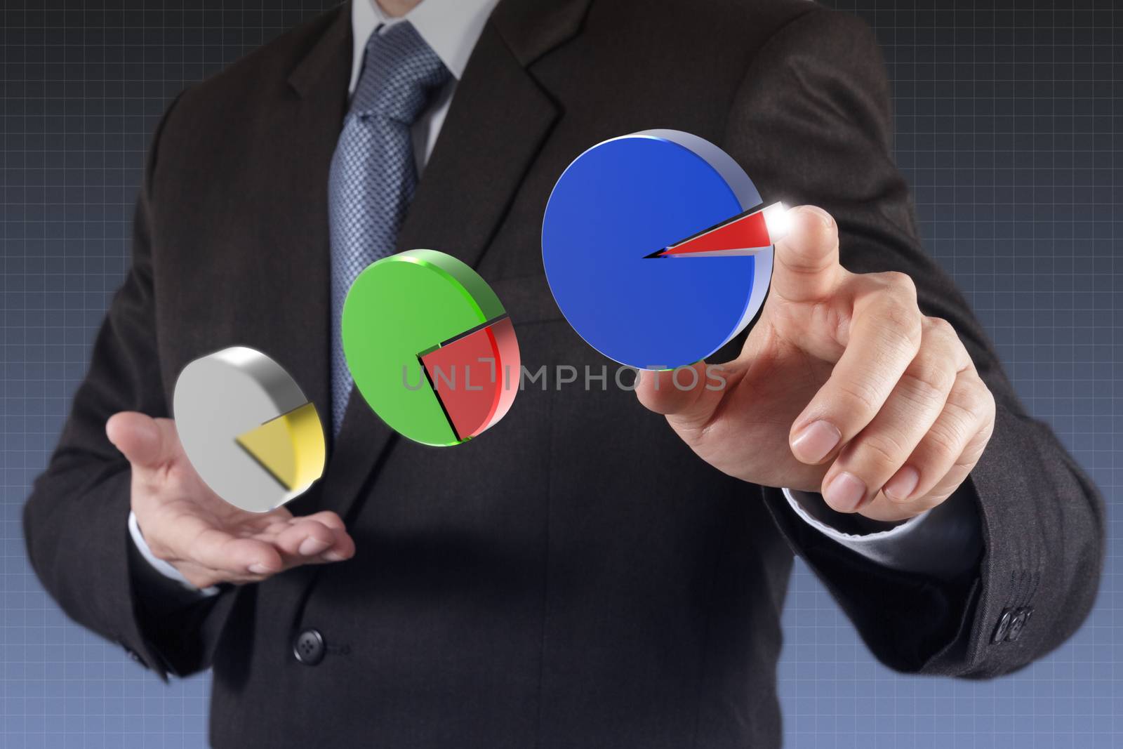 businessman hand drawing a pie chart and 3d graph