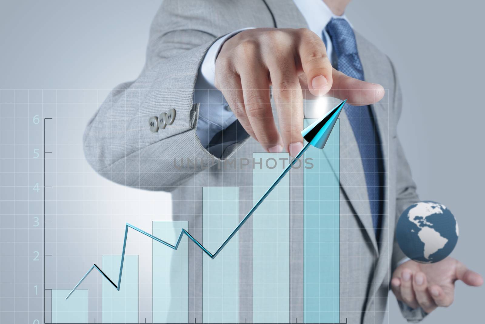 businessman hand drawing a pie chart and 3d graph