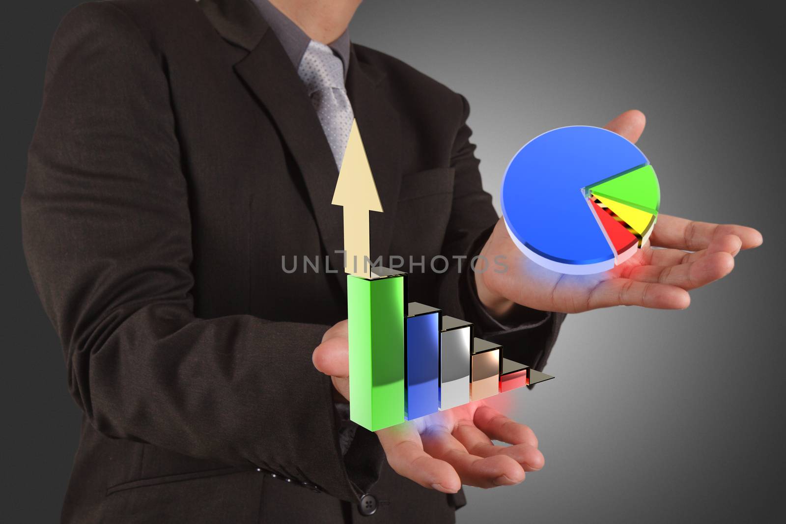 businessman hand drawing a pie chart and 3d graph