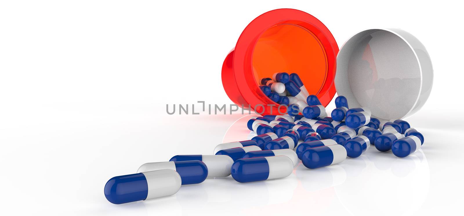 Pills spilling out of pill bottle isolated on white.