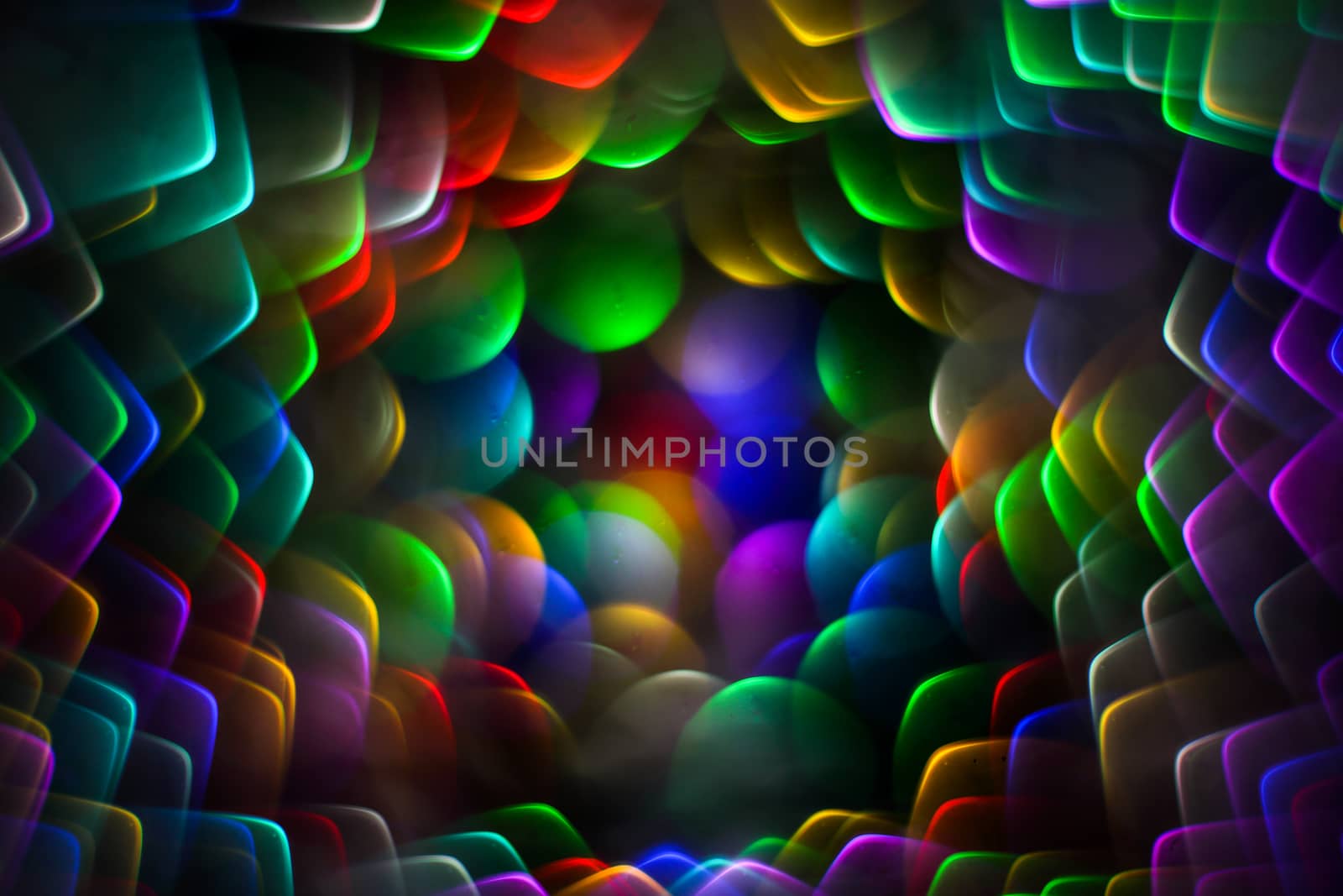 Festive abstract background with multicolored defocused lights. Natural defocused photo. Unique bokeh effect. Photo with copy space.