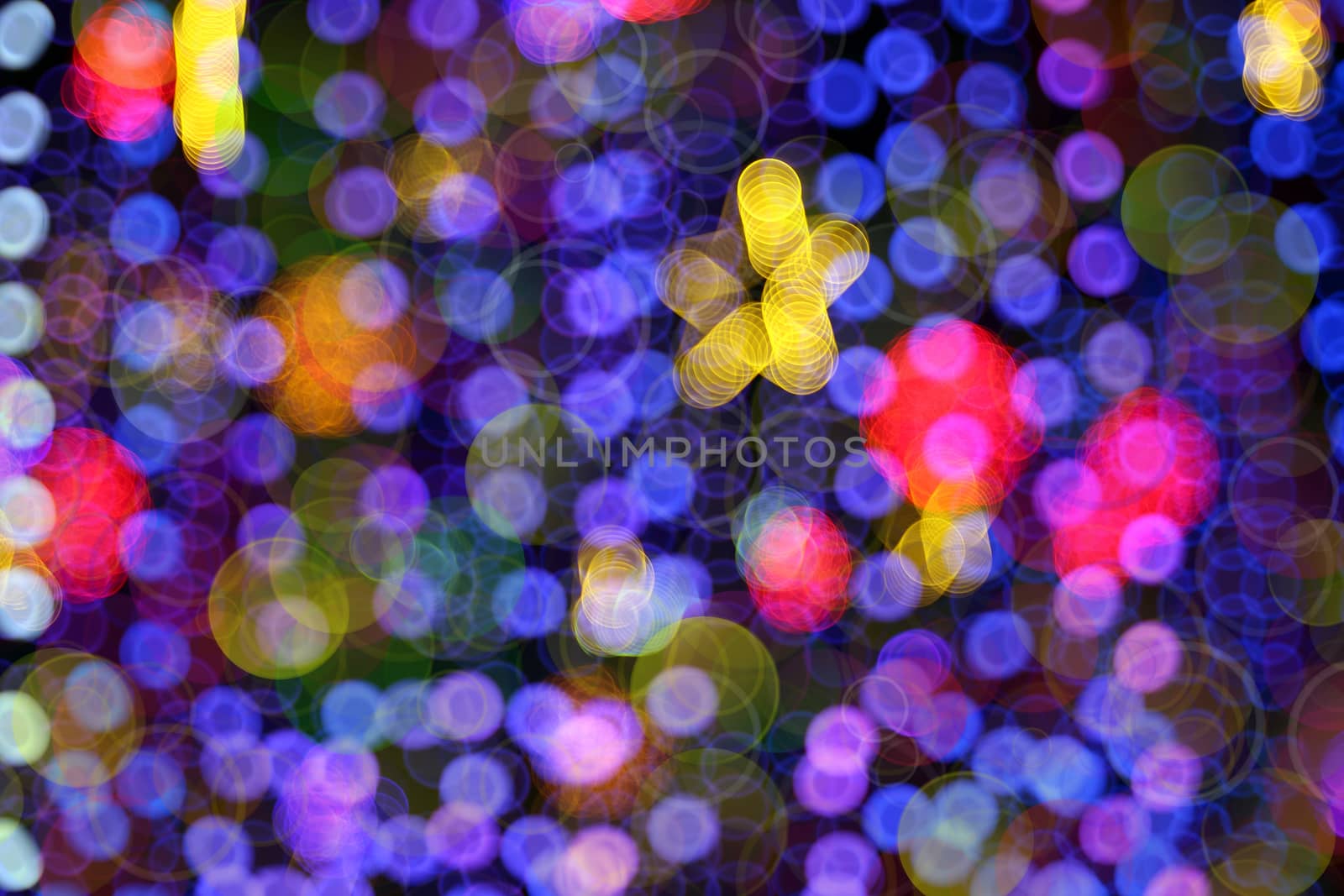 Abstract, defocused, blurred Christmas light background. Multicolor bubble bokeh circle background.