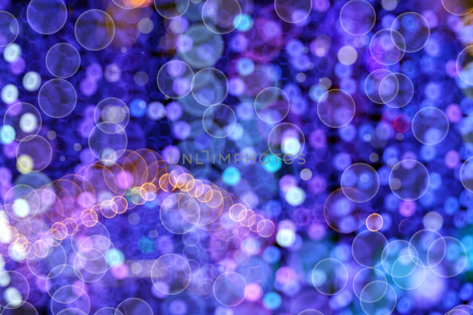 Christmas lights and ornaments. Multicolor bokeh circle background (illumination garland decoration). 