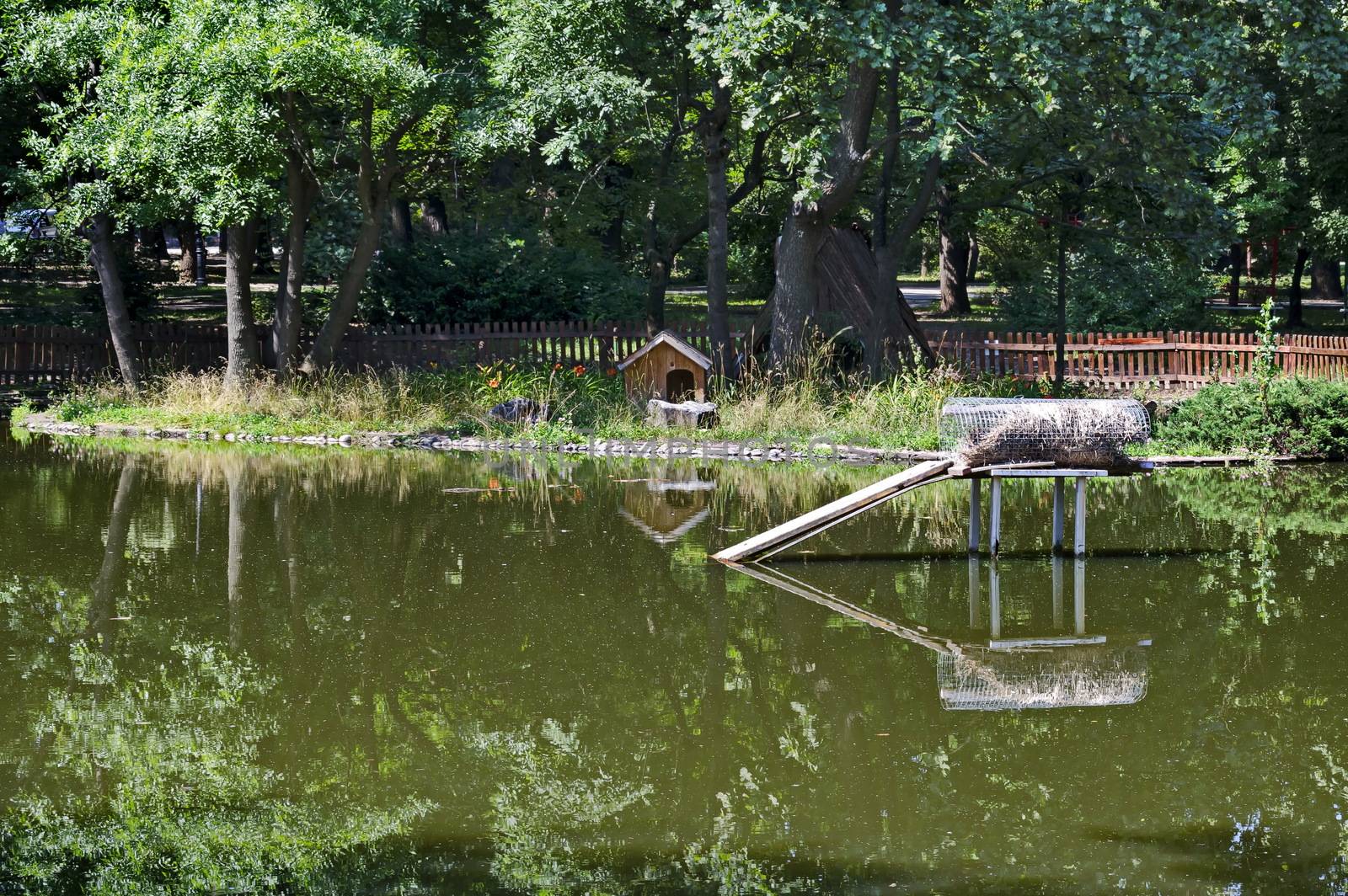 A small house built into the lake and nesting place for ducks in the city garden, Sofia, Bulgaria