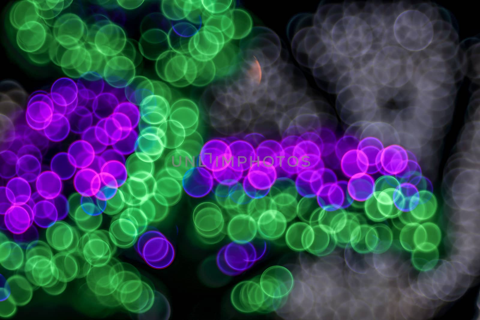 Festive elegant abstract background with bubble bokeh multicolored lights. Background with defocused lights. 