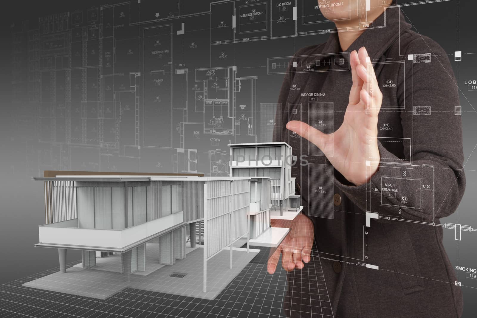 businesswoman hand shows house model as concept