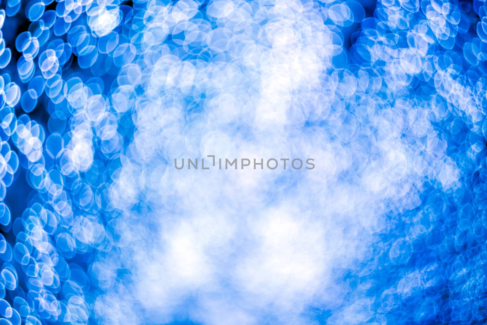 Christmas abstract background with bokeh lights. Beautiful shiny background with bokeh. Picture with copy space.