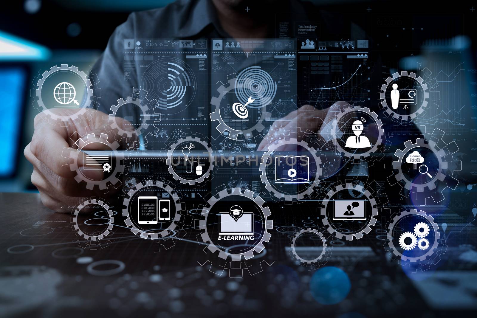 E-learning with connected gear cogs connected diagram virtual dashboard.Medicine doctor hand working with modern computer interface as medical network concept