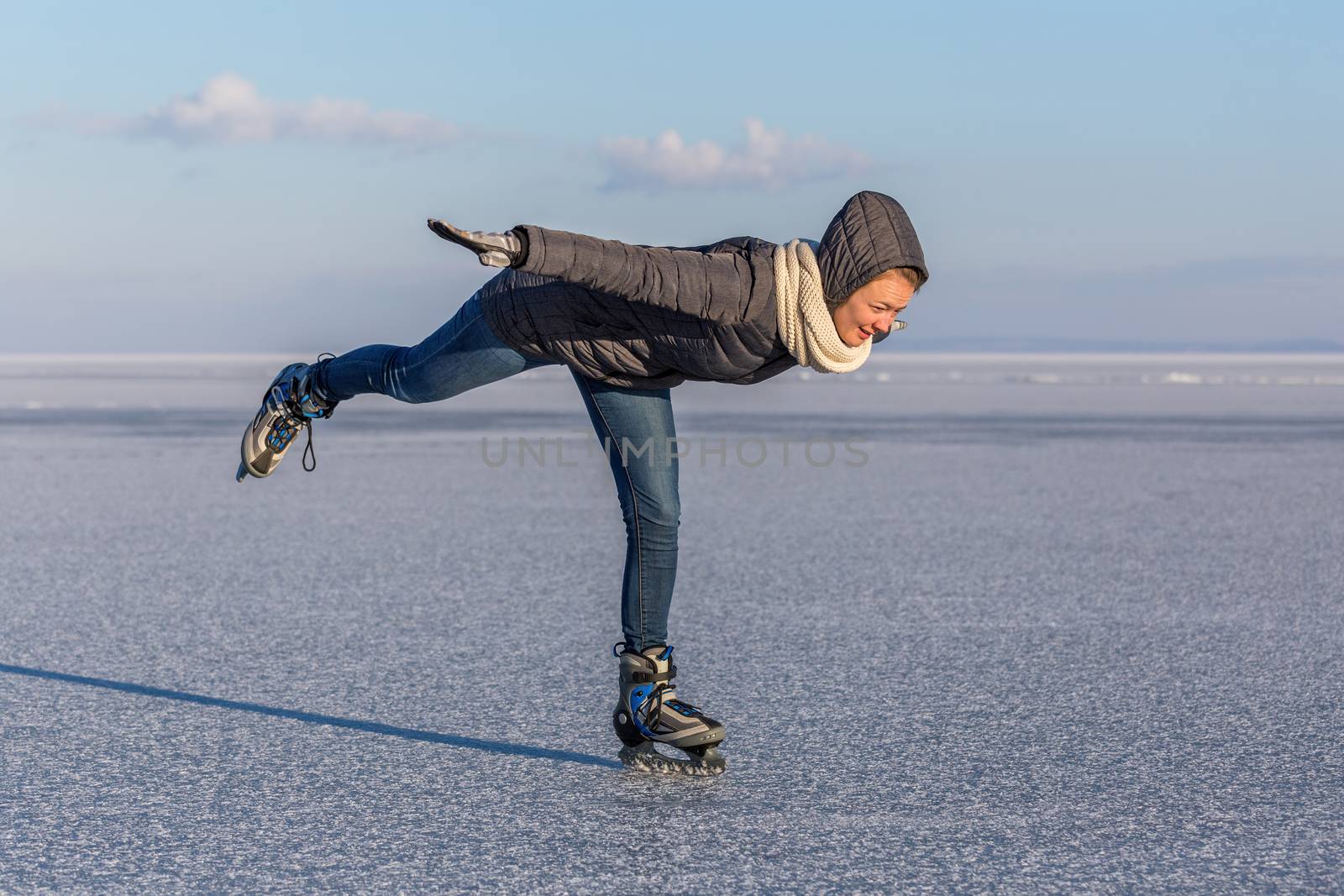 Young girl skating on Lake Balaton in Hungary