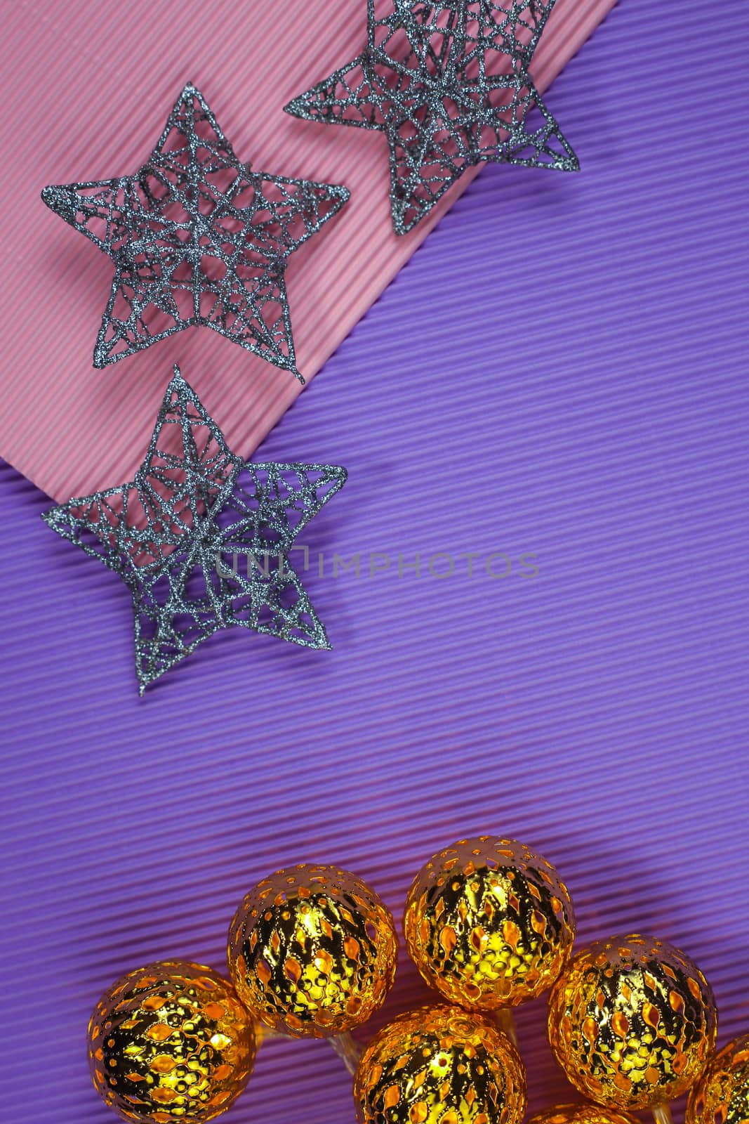 Creative design of Christmas decorations on color paper background. Garland. New Year. Flat lay, top view, copy space. 