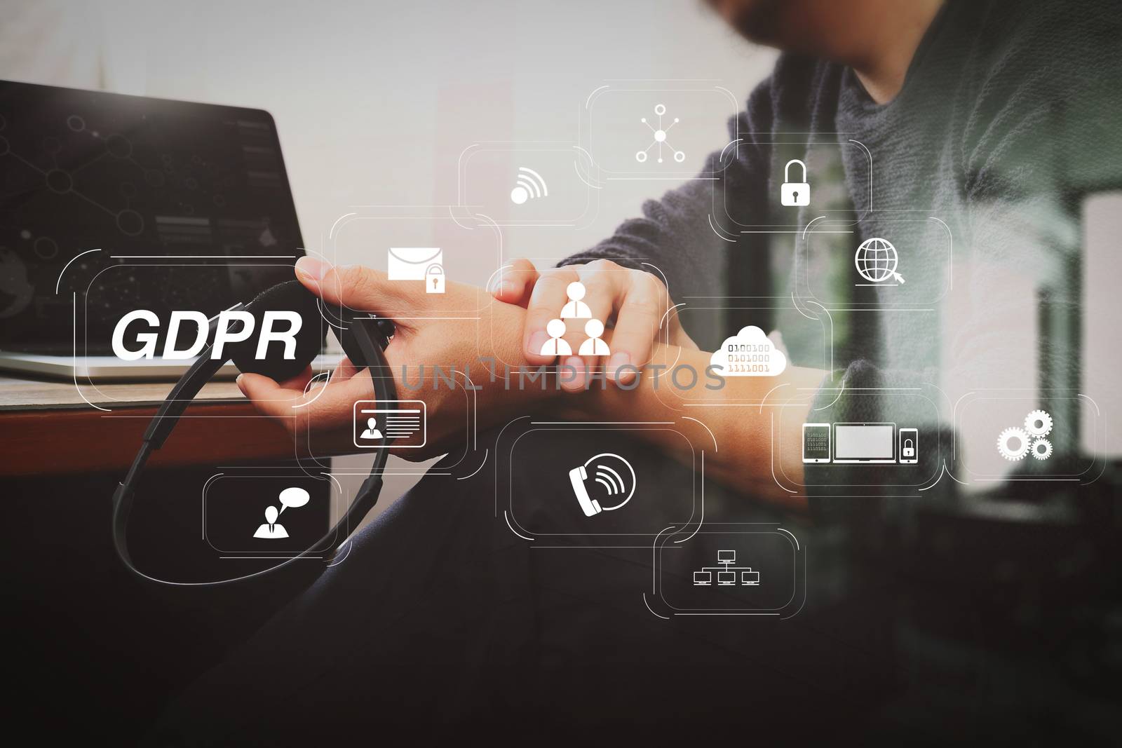 GDPR. Data Protection Regulation with Cyber security and privacy virtual diagram.Man using VOIP headset with digital tablet computer docking smart keyboard, concept communication, it support.
