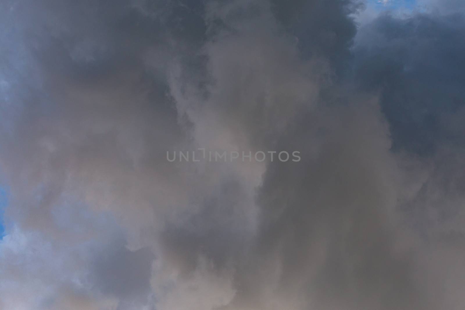 incoming storm close-up cloudscape at july daylight in continental europe.