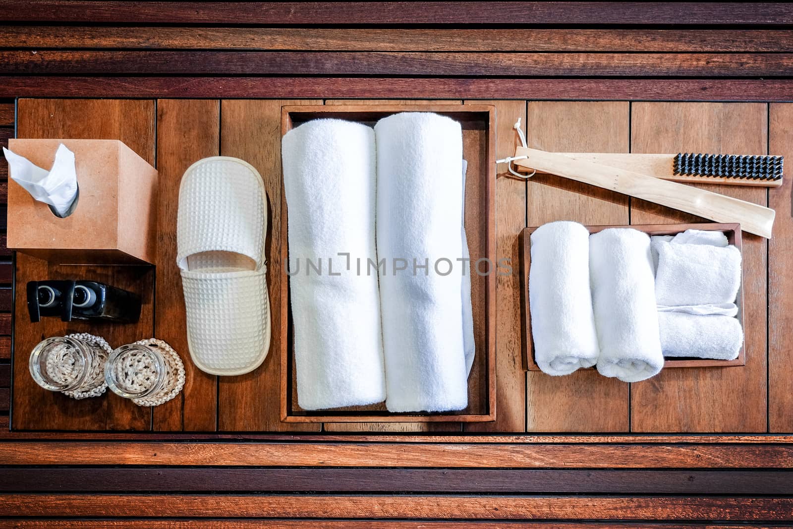 Bathroom set on wood background by Surasak